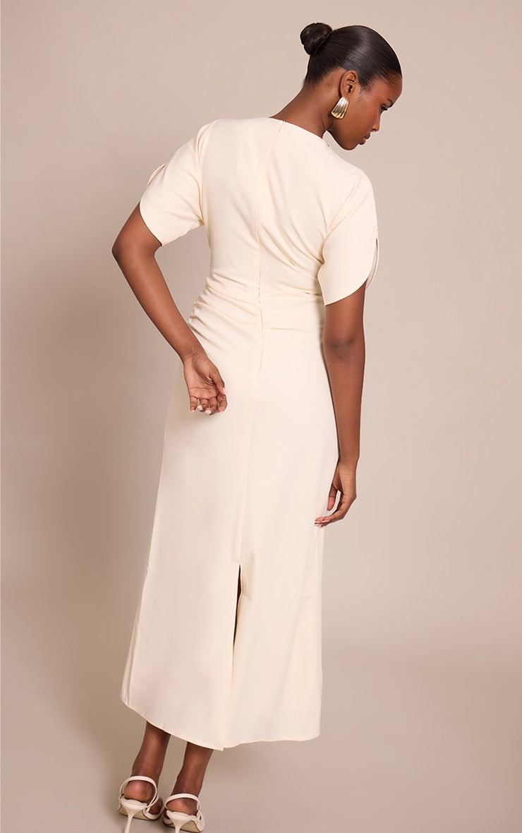 https://cdn-img.prettylittlething.com/3/2/f/6/32f6653827a6da963a21ecd4fab4f6c765ede83d_CNO3303_2_cream_short_sleeve_woven_maxi_dress.jpg
