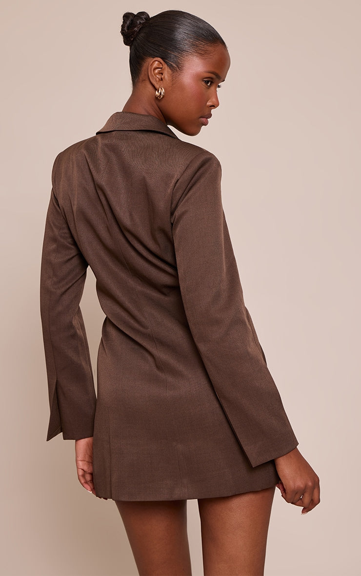 https://cdn-img.prettylittlething.com/5/8/b/d/58bdd0529165d69529a34dcaf8b76e55fcbd1db5_CNO3347_2_chocolate_woven_blazer_side_tie_mini_dress.jpg