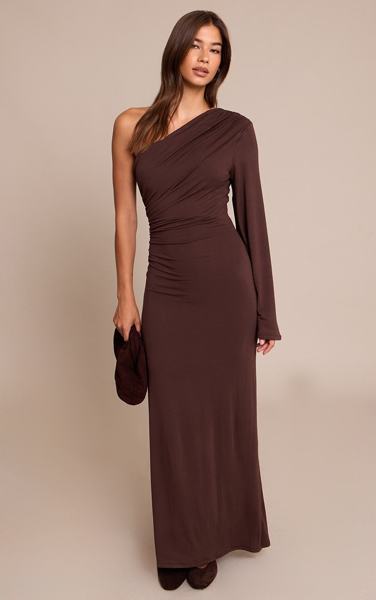 https://cdn-img.prettylittlething.com/7/8/1/b/781b48a6d75274b94448ec3930bffa1be8a58322_CNO3530_3_chocolate_jersey_one_shoulder_ruched_detail_maxi_dress.jpg