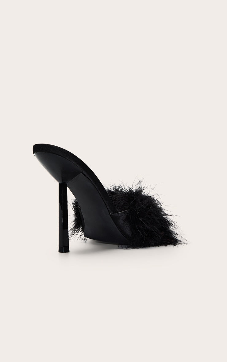 https://cdn-img.prettylittlething.com/3/2/1/7/32174007e0174e4b8cdbf0012910253038ed8f45_CNO2801_4_black_feather_heeled_mule.jpg