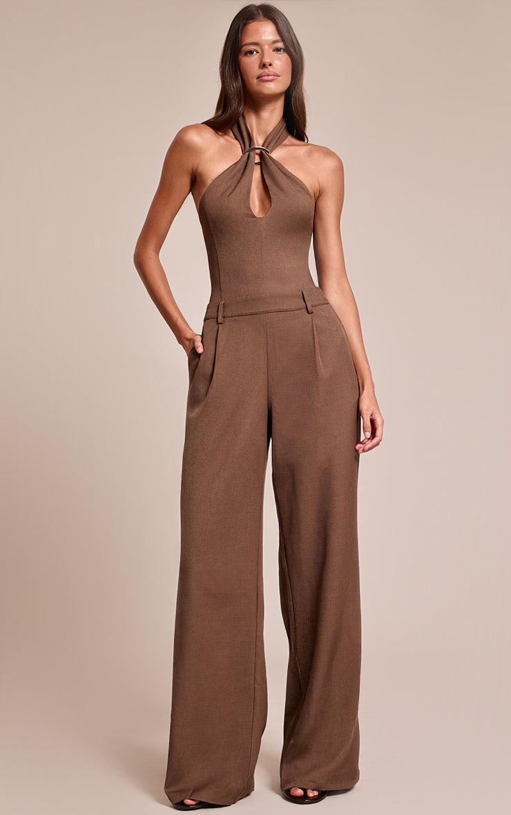 https://cdn-img.prettylittlething.com/4/4/3/5/4435cc81d49ca52f9f3a270447ca2cd61ebeaaaa_CNO0443_1_chocolate_woven_halterneck_trim_wide_leg_jumpsuit.jpg