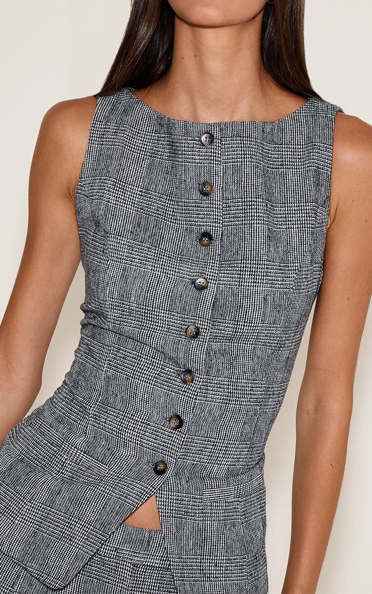 https://cdn-img.prettylittlething.com/a/a/1/d/aa1d373b91d0e8299f5504dfb000fe8f5eeadffe_CNO0666_4_grey_checked_woven_waistcoat.jpg